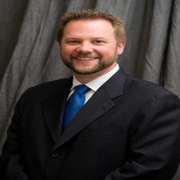 John P. Karoly