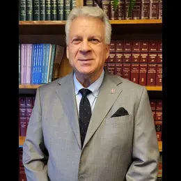 ROY M. BOWES